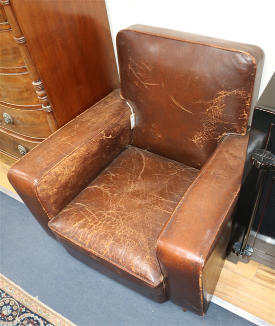 A pair of French leather club armchairs
